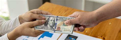 Buy or sell foreign currency .